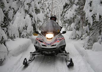 Snowmobiling in Northern Vermont Snowmobiling in Northern Vermont near Lake Willoughby