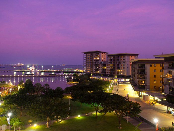 An Aerial View of a City at Night — Attention to Detail Cleaning Services & Deck Coating Darwin in Casuarina, NT