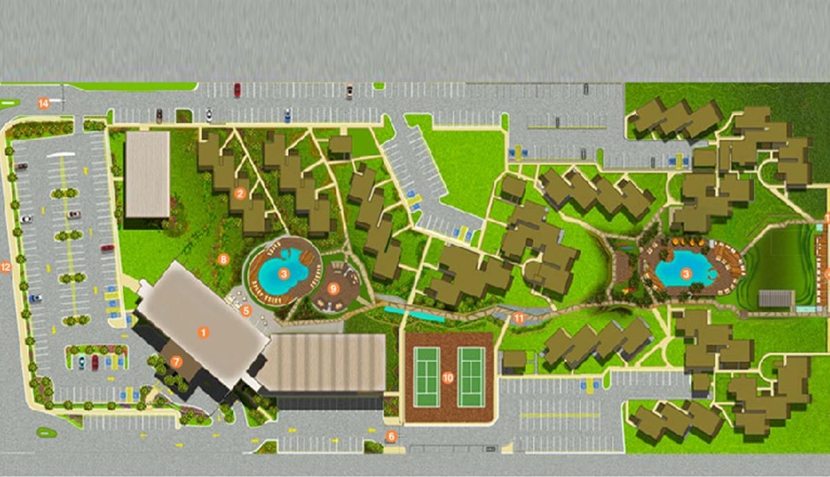 Una vista aérea de una zona residencial con muchos edificios y una piscina.