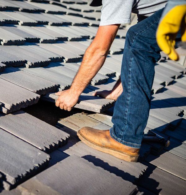 Professional worker installing a new roof for the commercial building — Corpus Christi, TX — Gill Roofing Co Inc