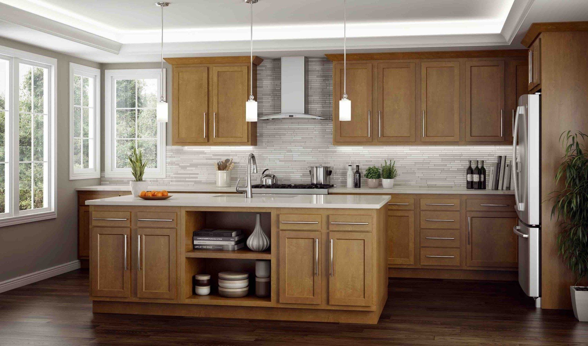 A kitchen with wooden cabinets , stainless steel appliances , and a large island.
