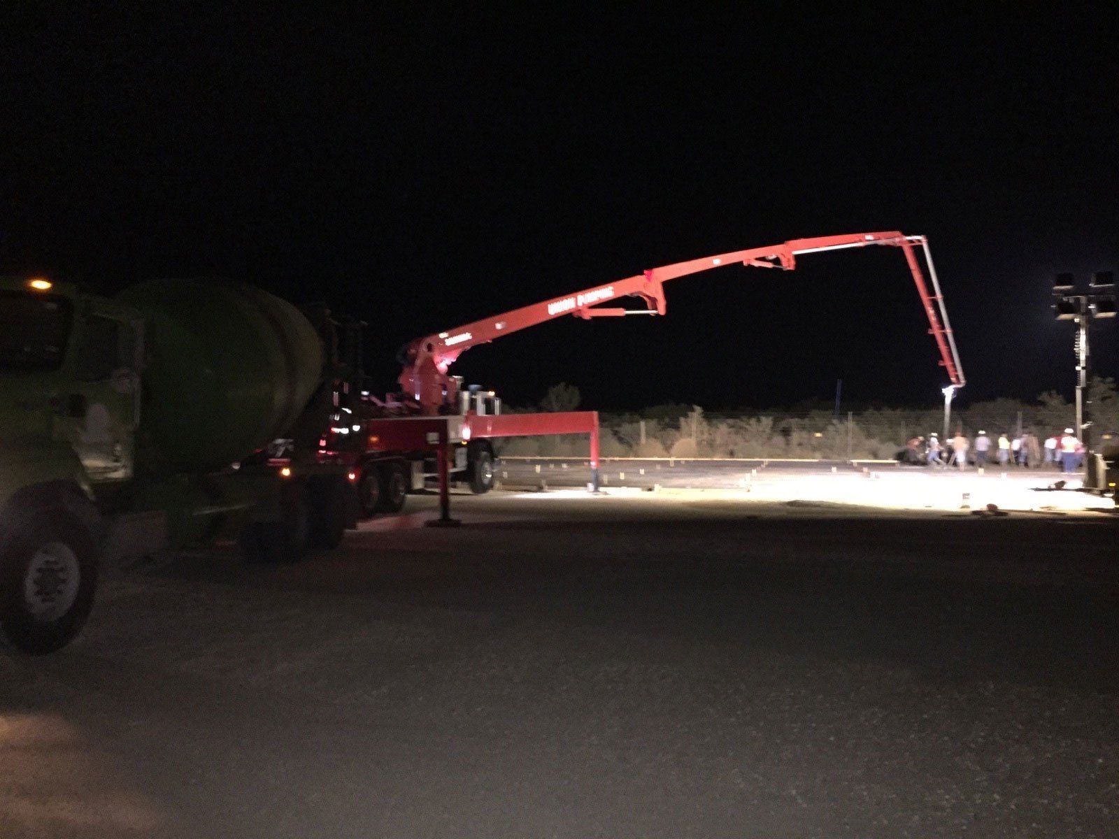 Concrete Crew Working At Night