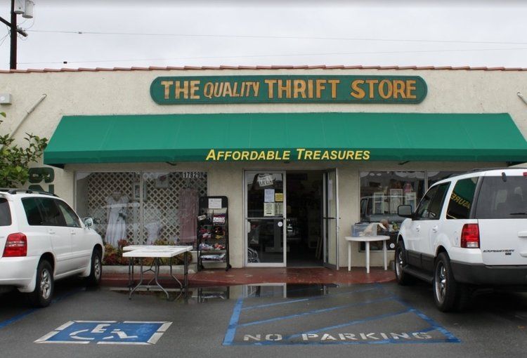 Exterior of the Affordable Treasures Thrift Store featuring a forest green awning. Exterior of the Affordable Treasures Thrift Store in Artesia, CA.