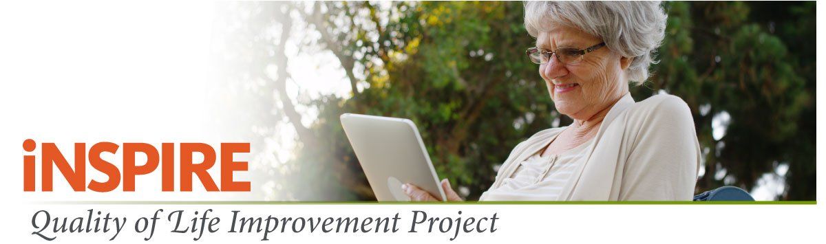 Older woman using a tablet outdoors; logo reads 