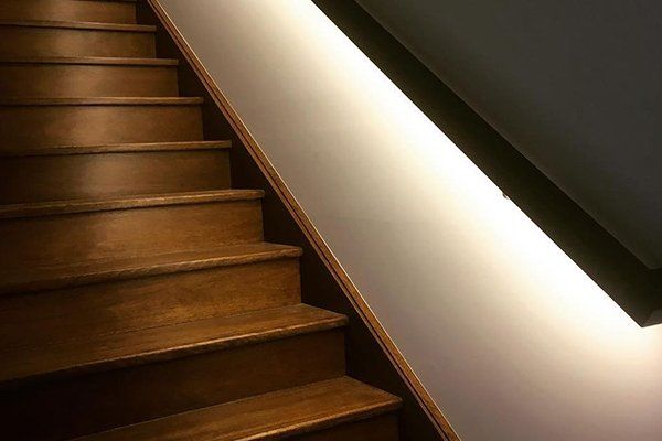 Stairs With Lights — Electrical in Balgownie, NSW Stairs With Lights — Dumbwaiters in Balgownie, NSW
