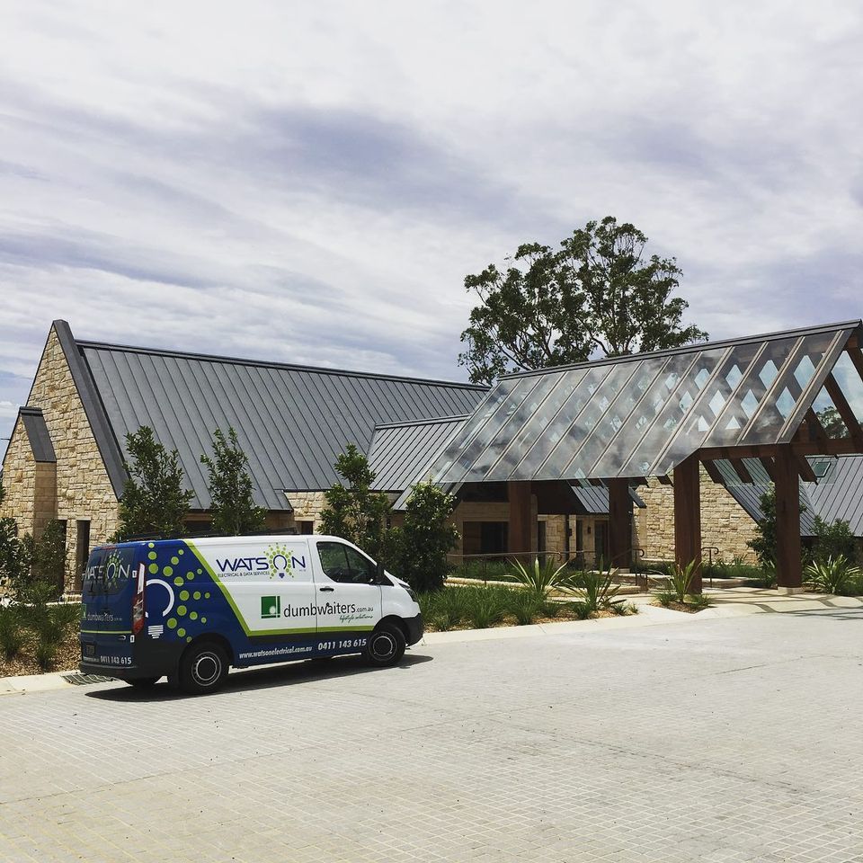 Van Side View Park On The Road — Electrical Projects in Balgownie, NSW