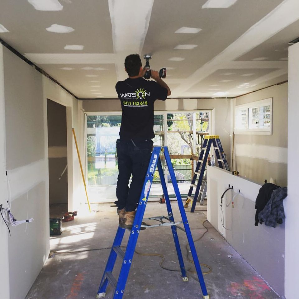 Man Working On Commercial Data Cabling — Electrical Projects in Balgownie, NSW