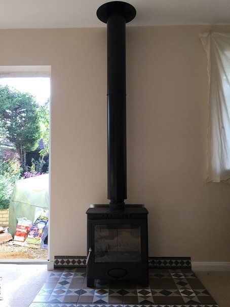 Traditional stove with Twin Wall installation on tiled hearth