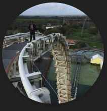 Man standing on roller coaster