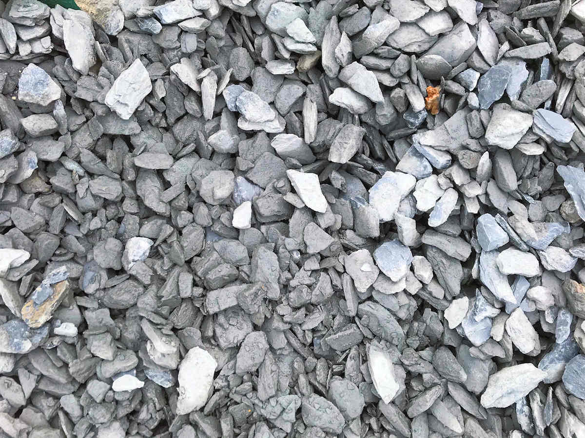 Gray and white slate gravel, close-up view.
