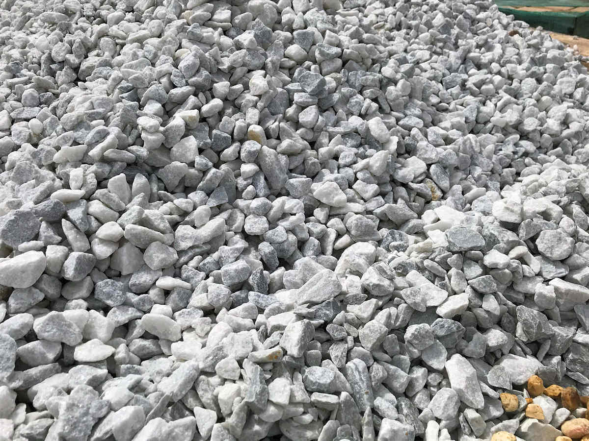 Pile of light gray and white marble gravel.