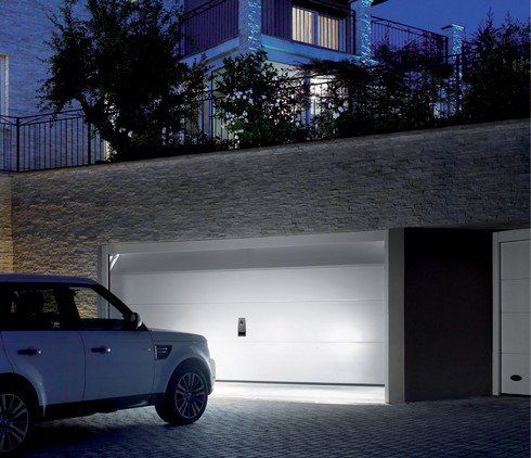 Porte sezionali residenziali automatiche Ditec Entrematic