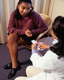 Nurse Giving Birth Control Pills - Pregnancy Care in Warren, OH Nurse Giving Birth Control Pills - Pregnancy Care in Warren, OH