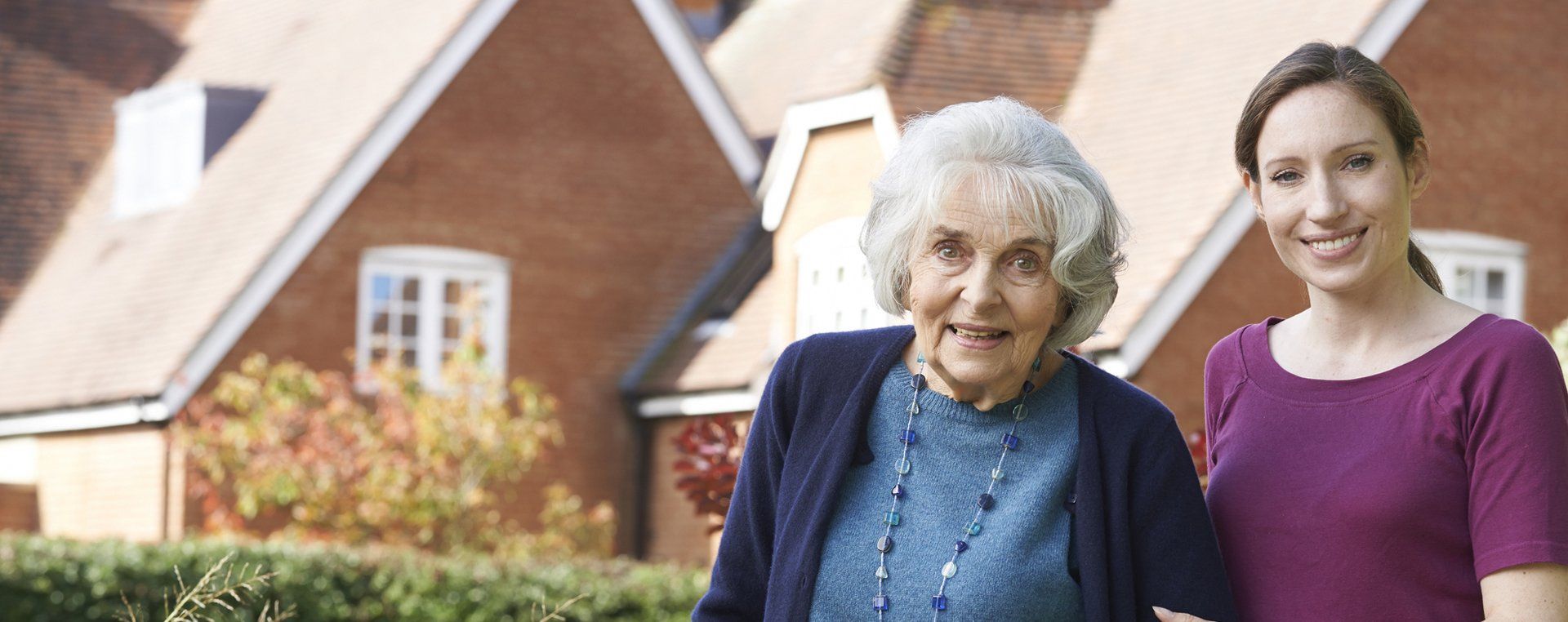 Memory Care Resident With Her Caregiver