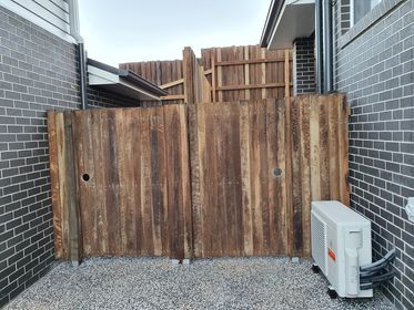 wooden gates on a wooden fence