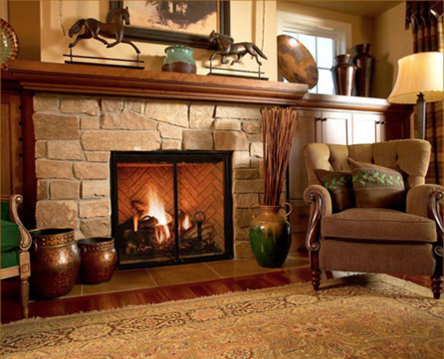 A living room with a fireplace and a chair