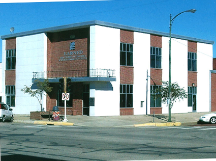 Automatic door with caution sign -  Commercial installation in Great Bend, KS