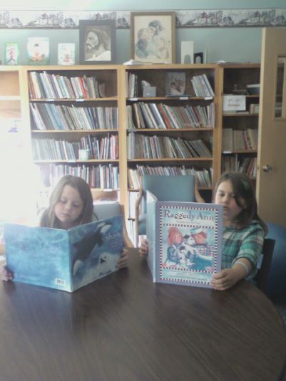 Youth reading in Church Library Clare, Mi