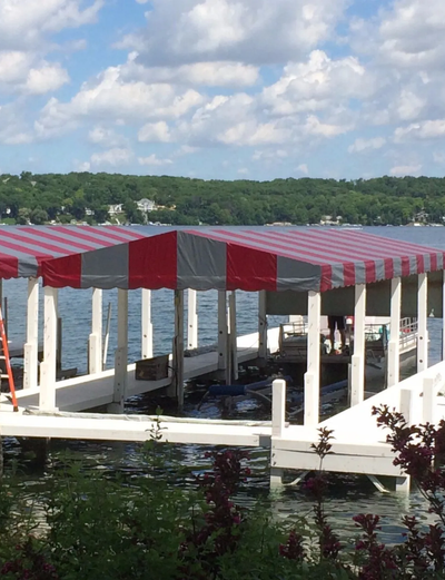 Wooden Boat With Bimini Top — Geneva, WI — Geneva Upholstering Corp Wooden Boat With Bimini Top — Geneva, WI — Geneva Upholstering Corp