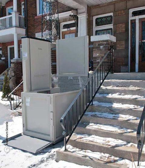 Enclosed wheelchair lift — elevator installation in Bothell, WA Enclosed wheelchair lift — elevator installation in Bothell, WA