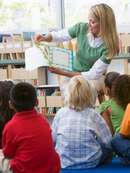 Teacher reading book to Preschool class- Cottage School , Boulder , Colorado Teacher reading book to Preschool class- Cottage School , Boulder , Colorado