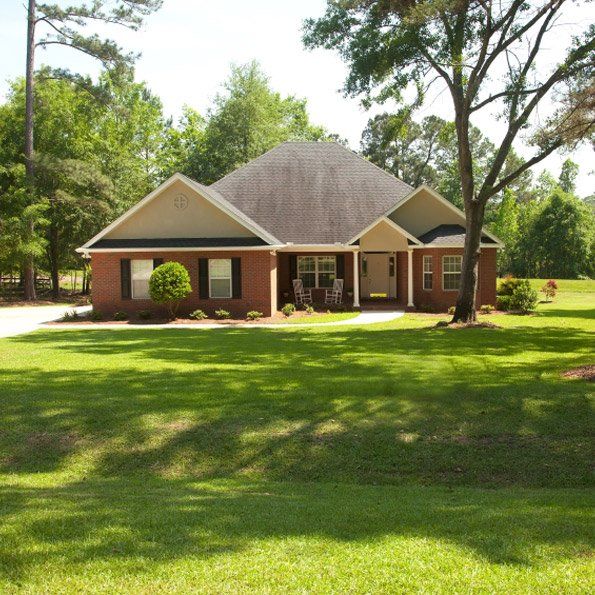 image of the exterior of a brown house