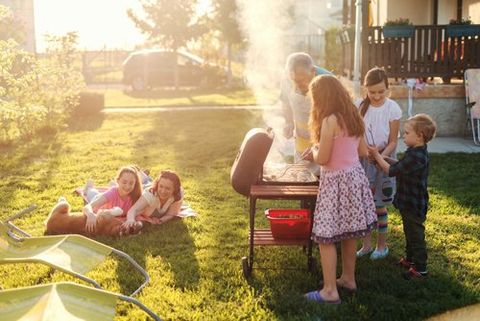 Family on Backyard Grilling Meal — Oldsmar, FL — The Spray Doctor Family on Backyard Grilling Meal — Oldsmar, FL — The Spray Doctor