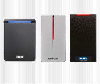 Three access card readers; black, white, and black, each with a colored LED light strip, the left most is blue.