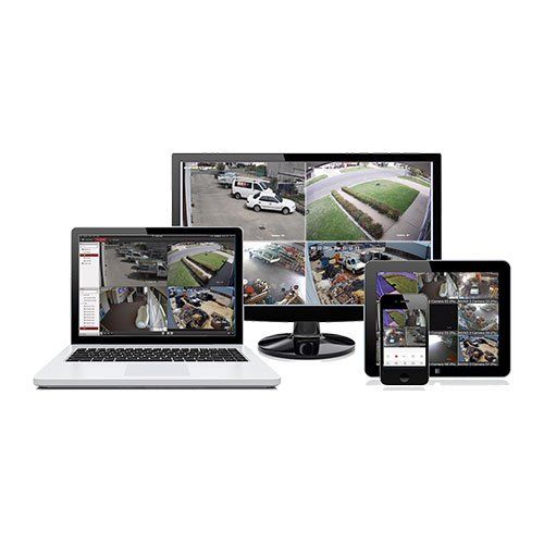 Security camera system displayed on various devices: laptop, monitor, tablet, and smartphone.