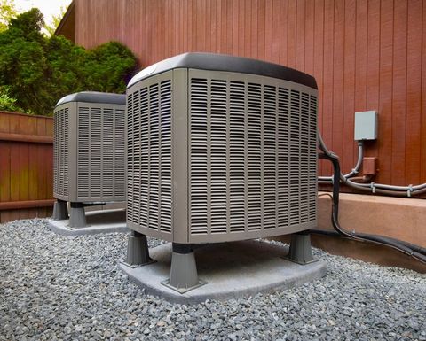 Cleaning air condition filter — Orangeburg, SC — Garden City Heating & Cooling