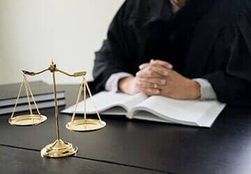 Desk in Courtroom — Corporation Law in Salina, KS Desk in Courtroom — Corporation Law in Salina, KS