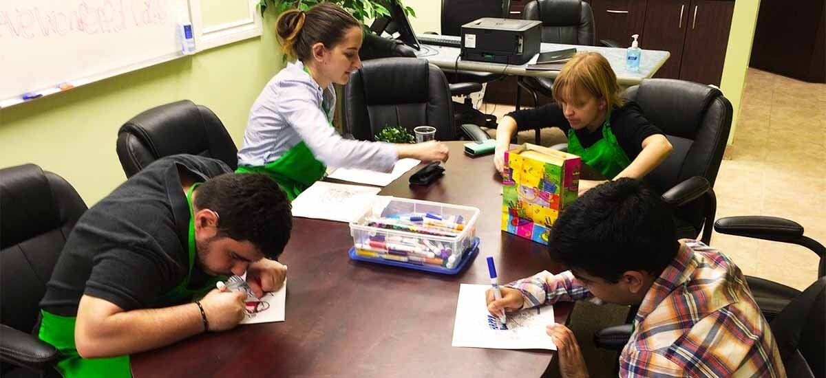 Students drawing in life skills centre