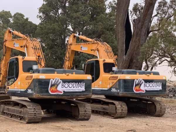 two backhoes