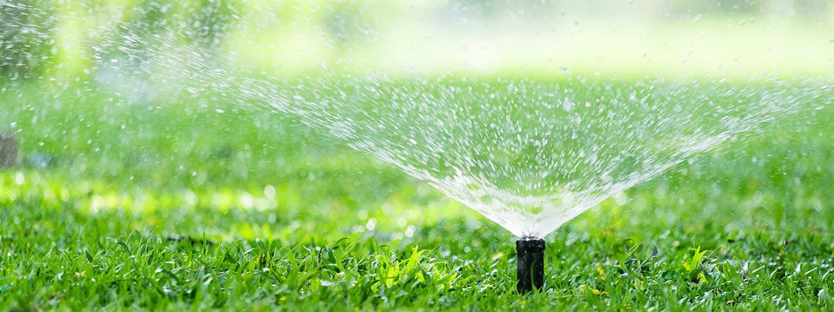 In-ground irrigation system with sprinkler head installed by Midwest Turf & Landscape. In-ground irrigation system with sprinkler head installed by Midwest Turf & Landscape.