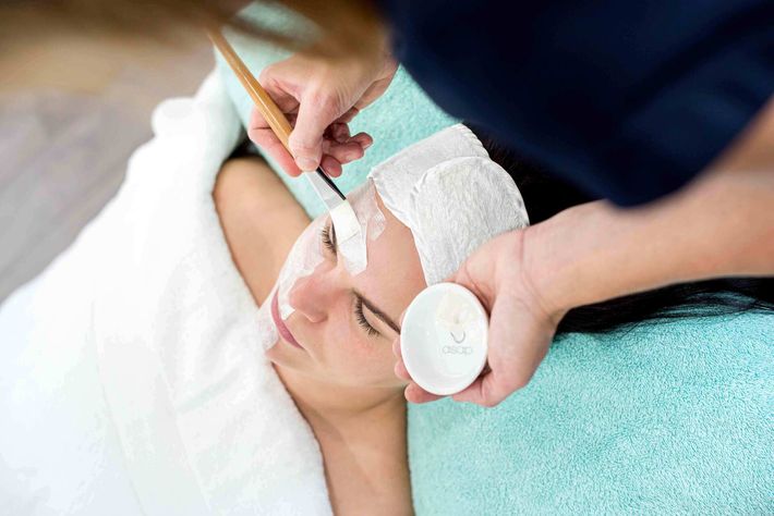 A Woman Receiving A Facial Beauty Treatment— Beauty Salon in Bundaberg, QLD