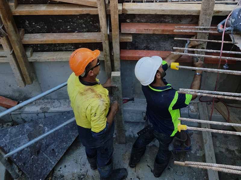two concrete workers