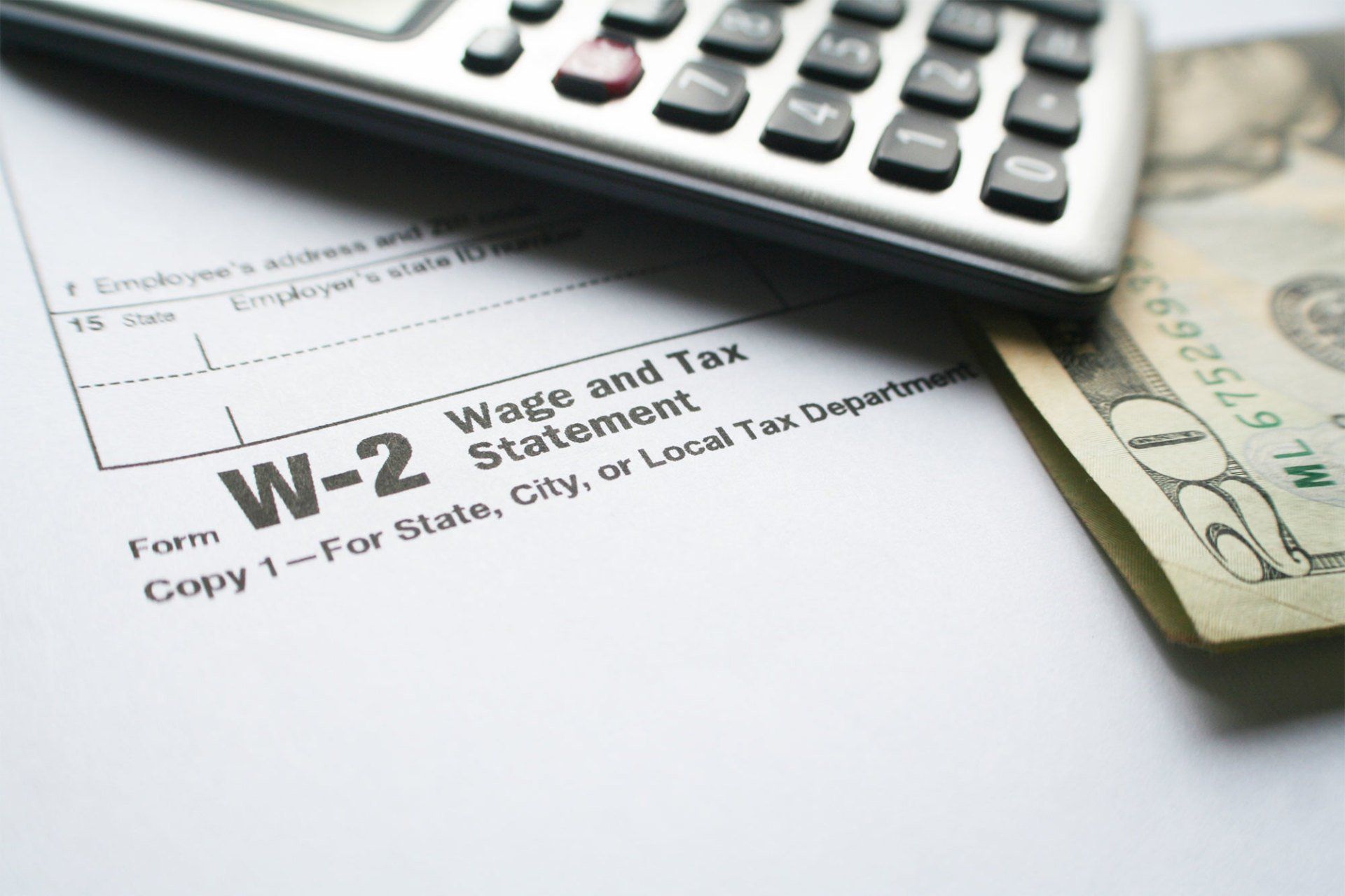 W-2 Tax Form With Calculator & Twenty Dollar Bill — Fort Walton Beach, FL — My Payroll Company W-2 Tax Form With Calculator & Twenty Dollar Bill — Fort Walton Beach, FL — My Payroll Company