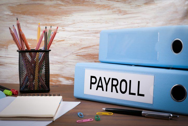 Payroll Folder at Wooden Office Desk — Fort Walton Beach, FL — My Payroll Company
