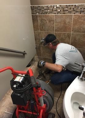 Man Inspecting Residential Pipeline — Port Huron, MI — Dynamic Drain Services