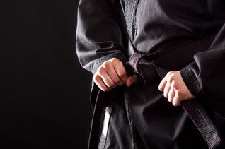 Tying The Knot Of His Black Belt — Richmond, KY — Richmond School of Karate Tying The Knot Of His Black Belt — Richmond, KY — Richmond School of Karate