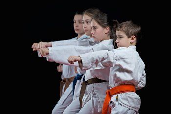 Kids Doing Karate — Richmond, KY — Richmond School of Karate Kids Doing Karate — Richmond, KY — Richmond School of Karate