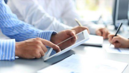 businessman using card reader