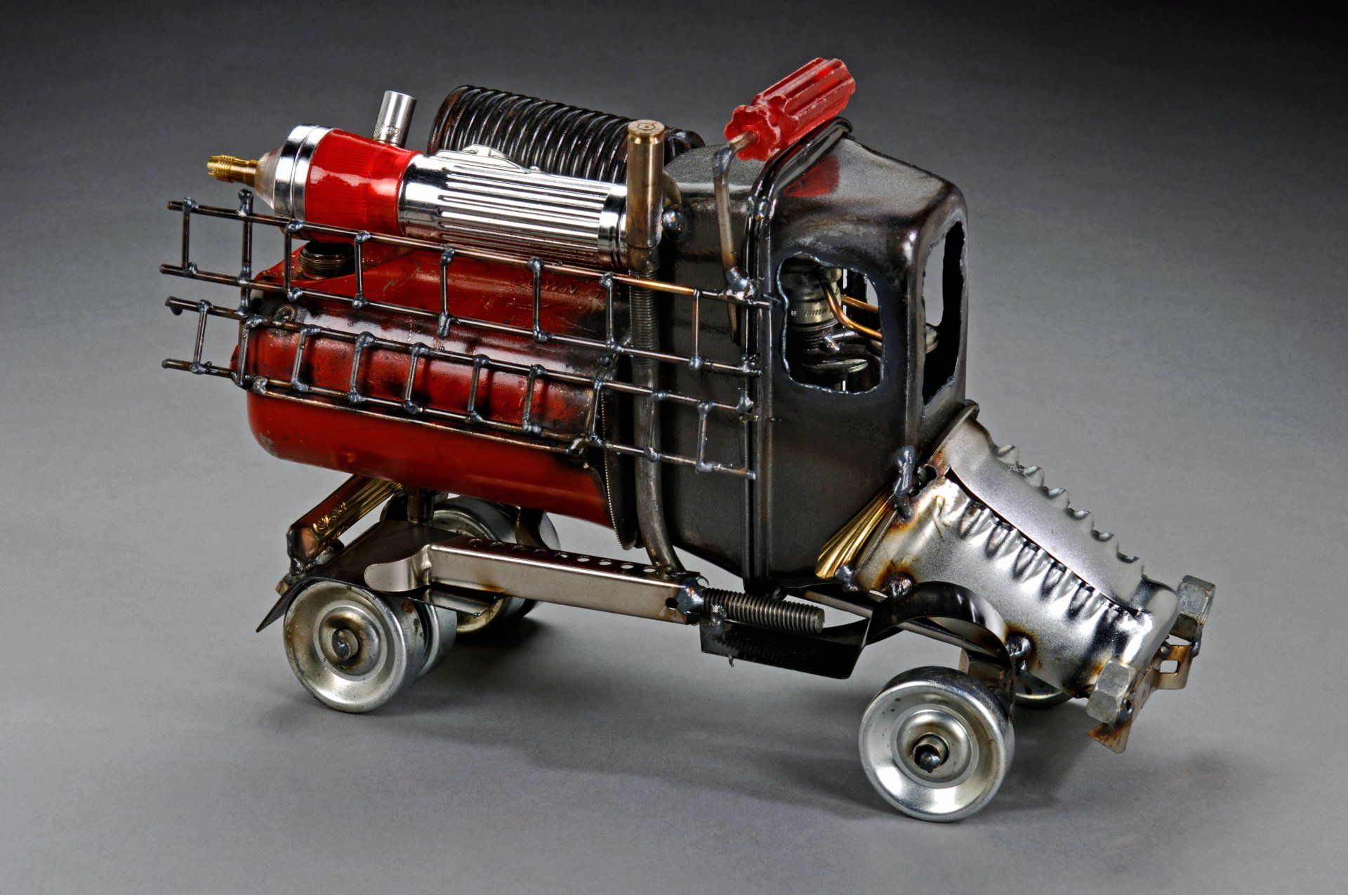 Sparkplug Sculpture of Fire Truck