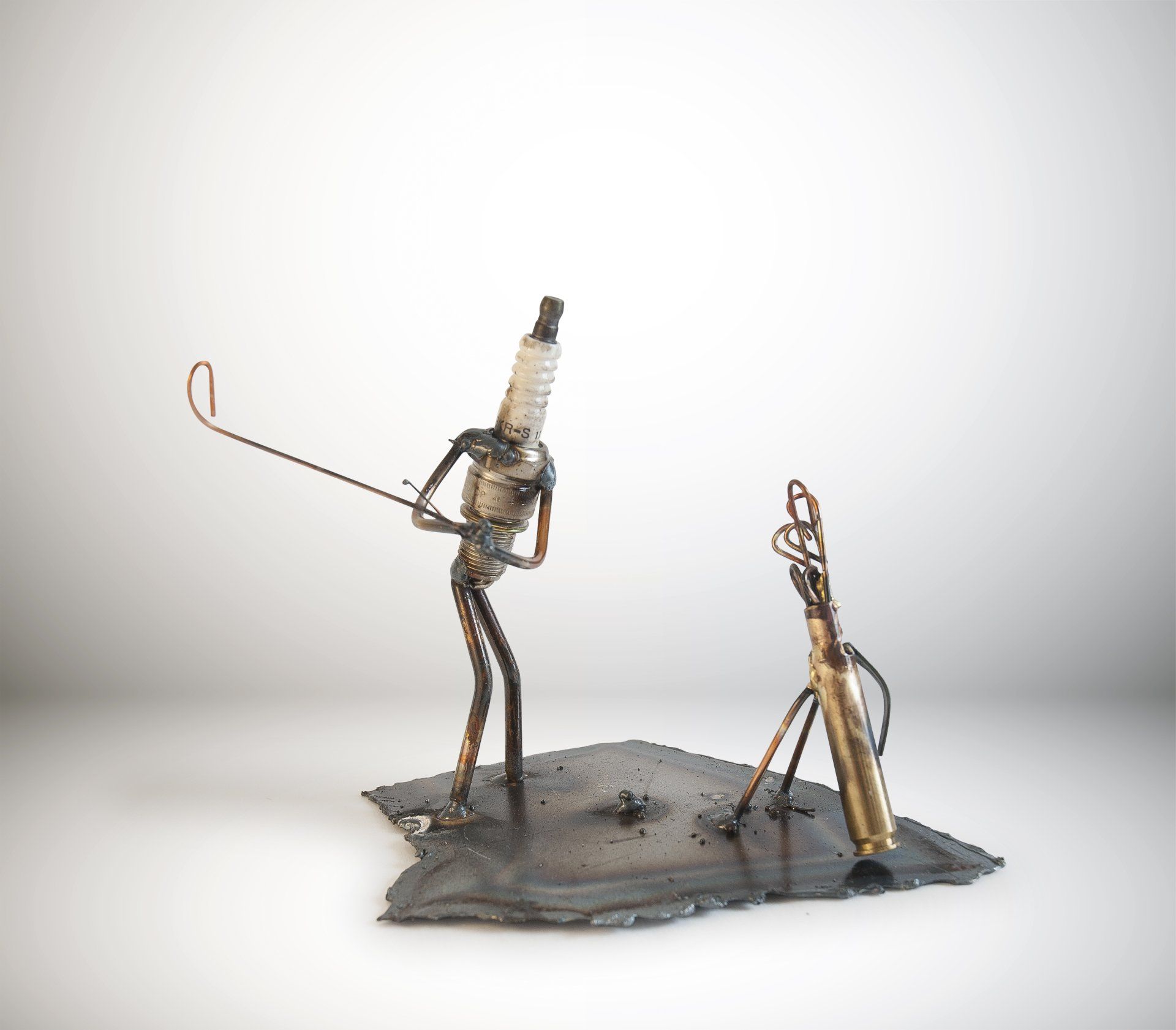 Sparkplug Sculpture Golfer with Golf Bag