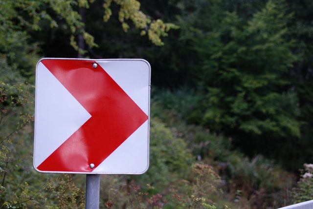 a red arrow signage