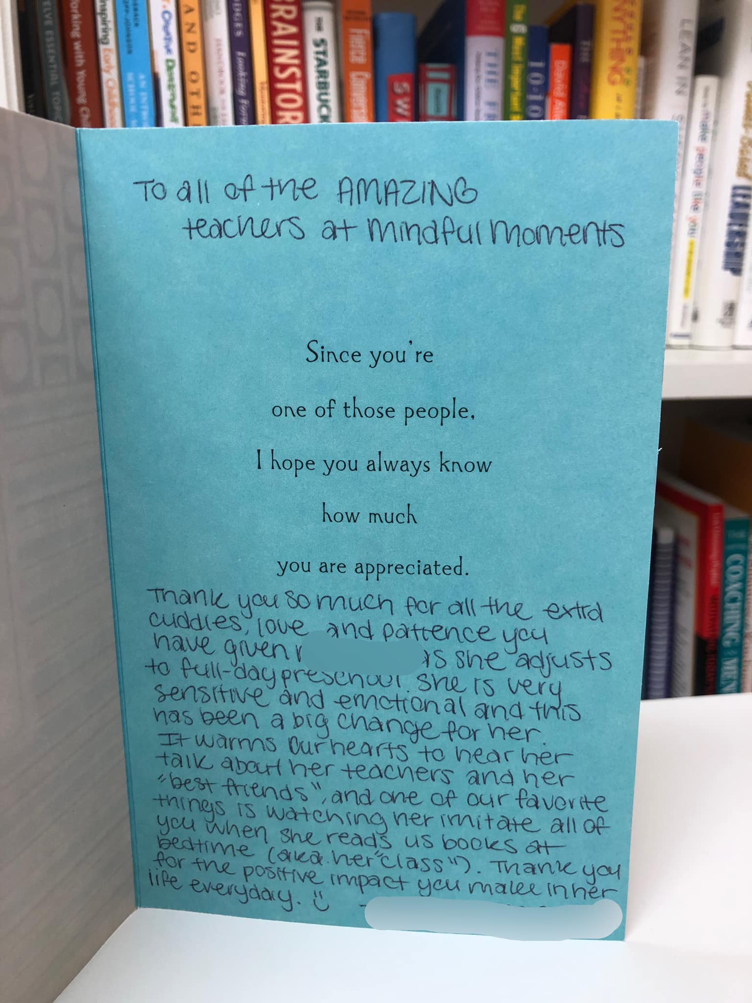 A book is open to a page that says ' to all of the amazing people ' on it