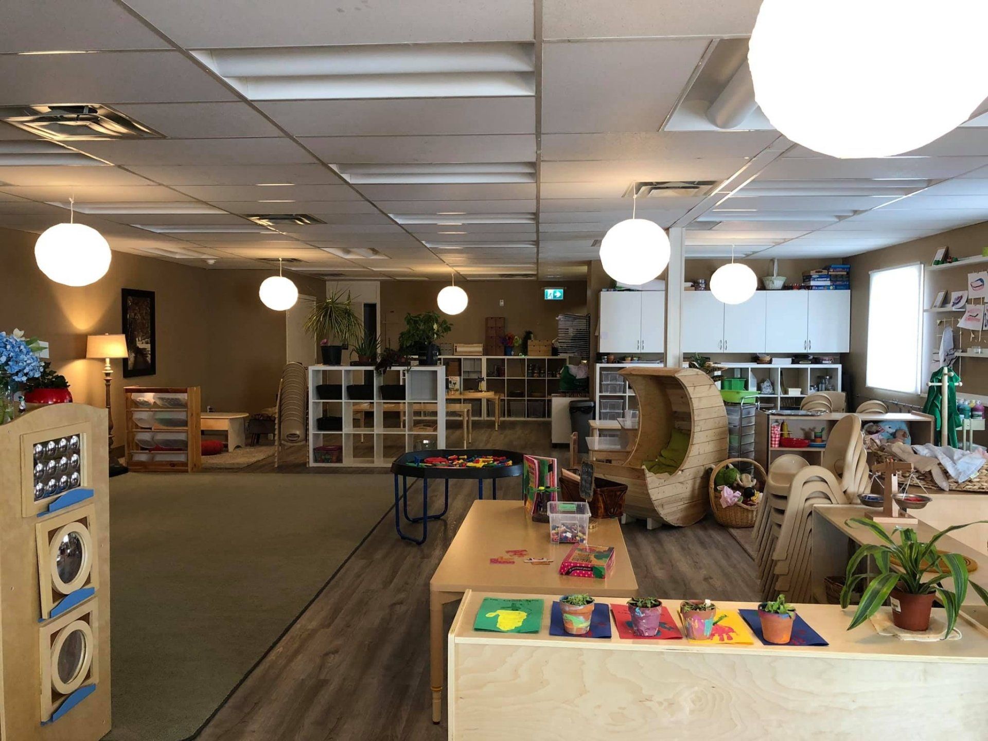 A large room filled with lots of furniture and toys.