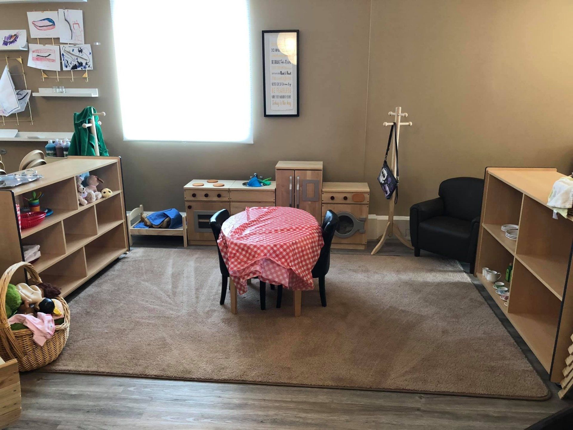 A room with a table and chairs in it