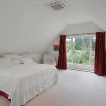 Germany, North-Rhine-Westphalia, Cologne, light-flooded classic modern bedroom