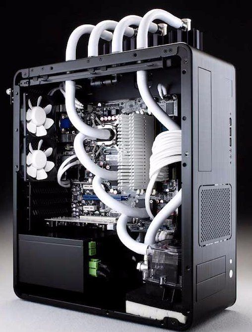 A black computer case with white tubes and fans